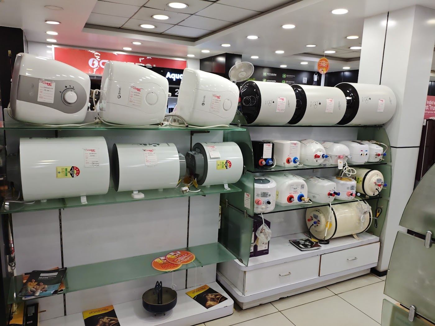 Wall of storage geysers on display inside the showroom